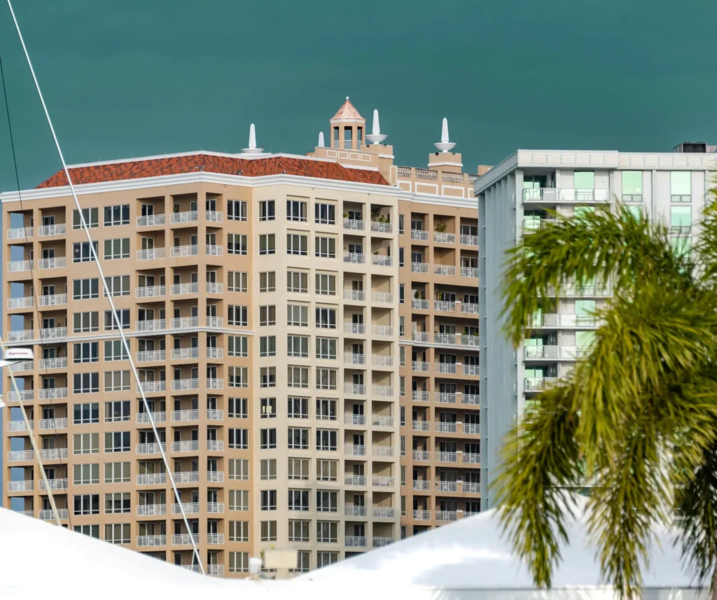 Florida coastal residential building with palm tree in Boca Raton